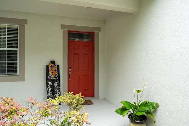 396 Winthrop Dr, Spring Hill, FL 34609 - entrance to property with stucco siding