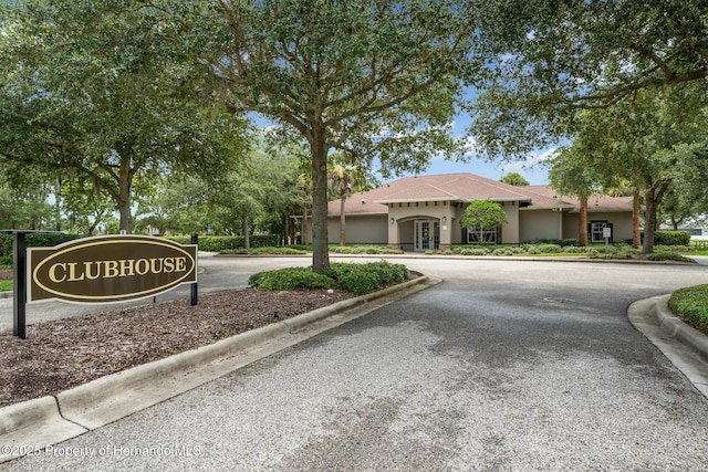 396 Winthrop Dr, Spring Hill, FL 34609 - view of asphalt road featuring curbs