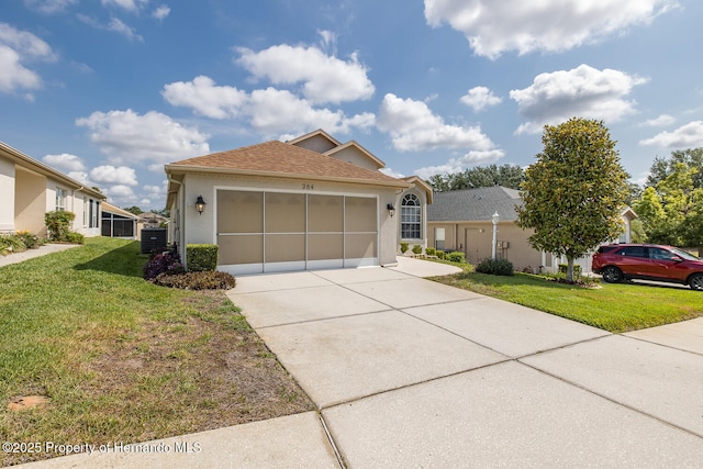 284 Quane Ave, Spring Hill, FL 34609 - ranch-style home with driveway, a front lawn, an attached garage, and stucco siding