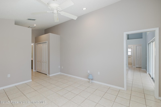 284 Quane Ave, Spring Hill, FL 34609 - unfurnished room featuring light tile patterned flooring, ceiling fan, recessed lighting, and baseboards