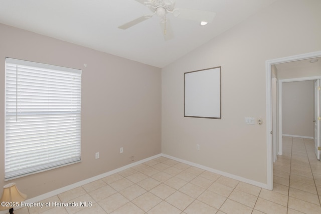 284 Quane Ave, Spring Hill, FL 34609 - unfurnished room with lofted ceiling, ceiling fan, light tile patterned floors, and baseboards