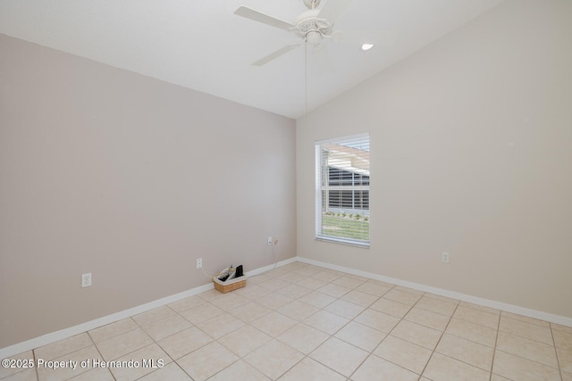 284 Quane Ave, Spring Hill, FL 34609 - empty room with vaulted ceiling, a ceiling fan, baseboards, and light tile patterned flooring
