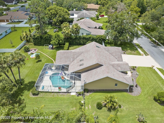 view of property location featuring a pool