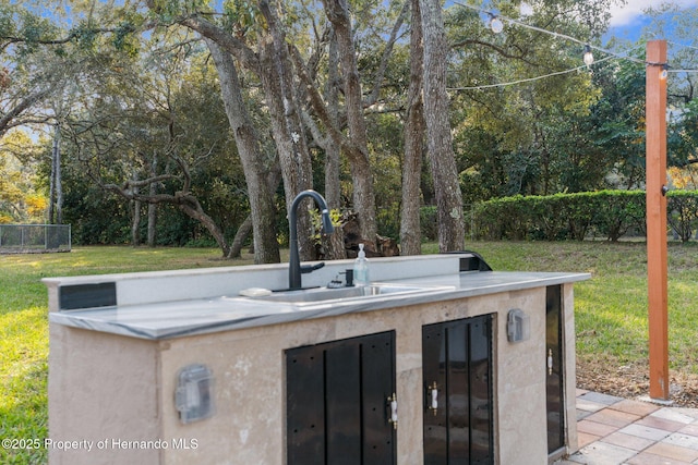 view of patio with a sink