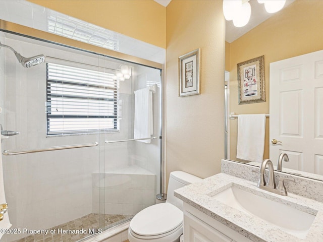11350 Copley Ct, Spring Hill, FL 34609 - bathroom featuring a shower stall, toilet, and vanity