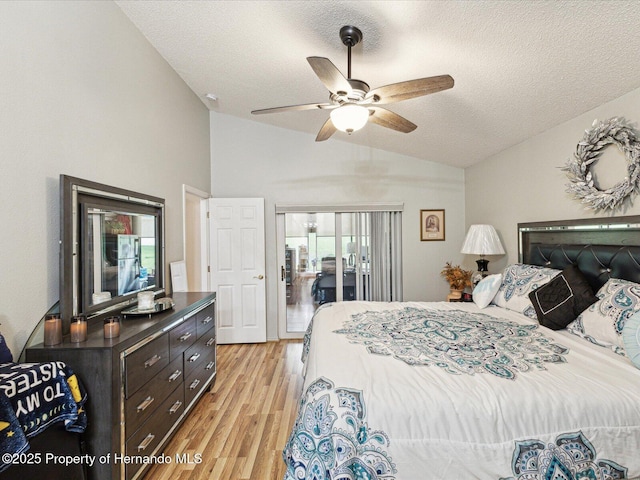 11350 Copley Ct, Spring Hill, FL 34609 - bedroom featuring lofted ceiling, light wood finished floors, a textured ceiling, and ceiling fan