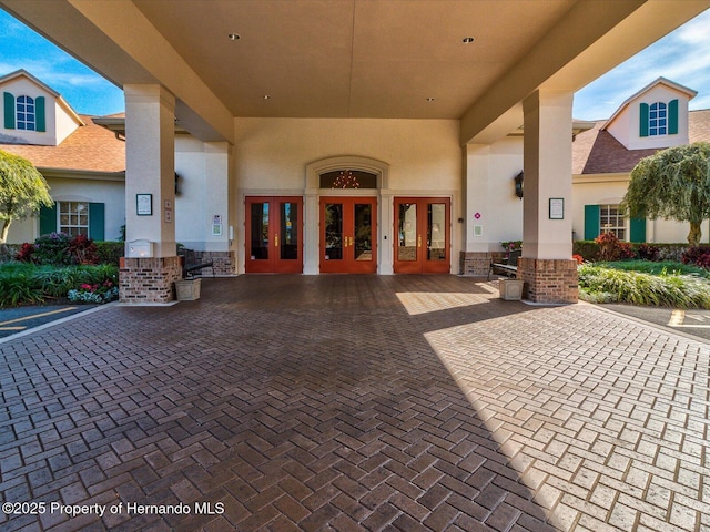 11350 Copley Ct, Spring Hill, FL 34609 - view of patio featuring french doors