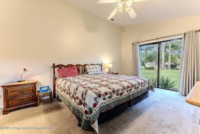 carpeted bedroom with access to outside and a ceiling fan