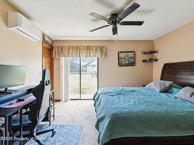 8393 Delaware Dr, Weeki Wachee, FL 34607 - bedroom featuring a wall mounted air conditioner, access to outside, carpet flooring, a textured ceiling, and an office area