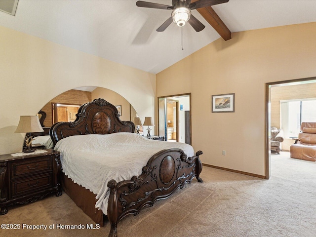 8393 Delaware Dr, Weeki Wachee, FL 34607 - carpeted bedroom with baseboards and arched walkways