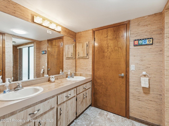 8393 Delaware Dr, Weeki Wachee, FL 34607 - bathroom featuring double vanity and wooden walls
