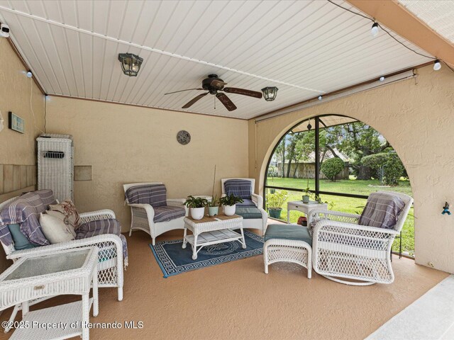 8393 Delaware Dr, Weeki Wachee, FL 34607 - view of patio with an outdoor hangout area and a ceiling fan