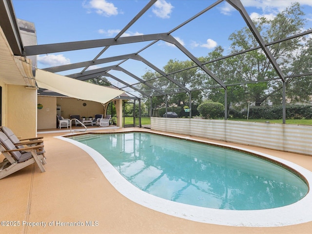 8393 Delaware Dr, Weeki Wachee, FL 34607 - outdoor pool featuring a patio, an outdoor hangout area, and glass enclosure