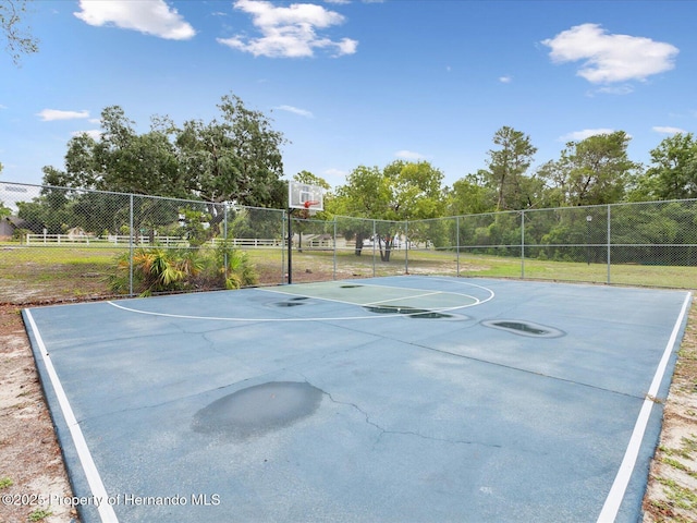 8393 Delaware Dr, Weeki Wachee, FL 34607 - view of sport court with community basketball court and fence
