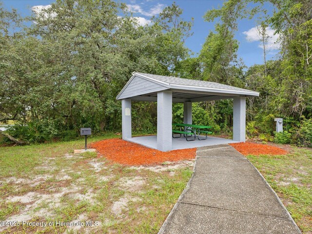 8393 Delaware Dr, Weeki Wachee, FL 34607 - view of home's community with a gazebo