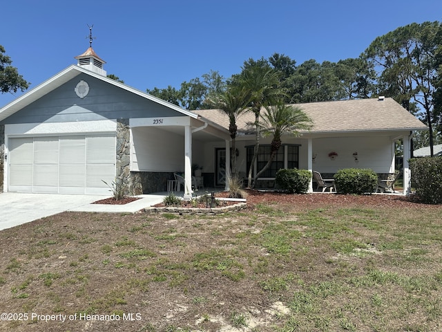 2351 Palm Springs Ct, Spring Hill, FL 34606 - ranch-style home featuring stone siding, concrete driveway, a porch, and a front yard