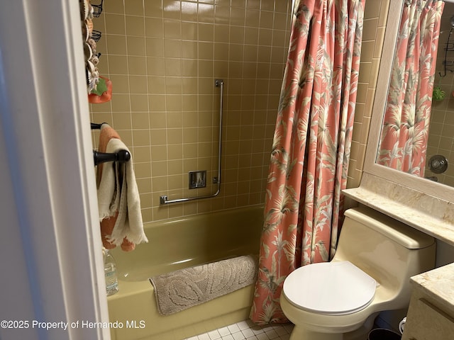 2351 Palm Springs Ct, Spring Hill, FL 34606 - bathroom featuring shower / bath combination with curtain, vanity, toilet, and tile patterned floors
