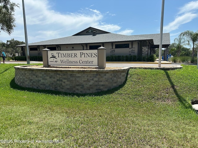 2351 Palm Springs Ct, Spring Hill, FL 34606 - community sign with a yard