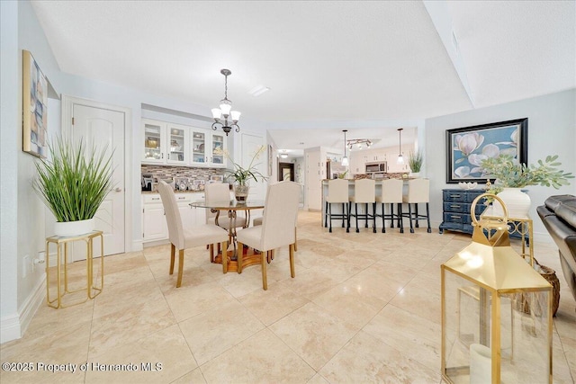 21000 Exeter Ct, Brooksville, FL 34601 - dining room with a chandelier