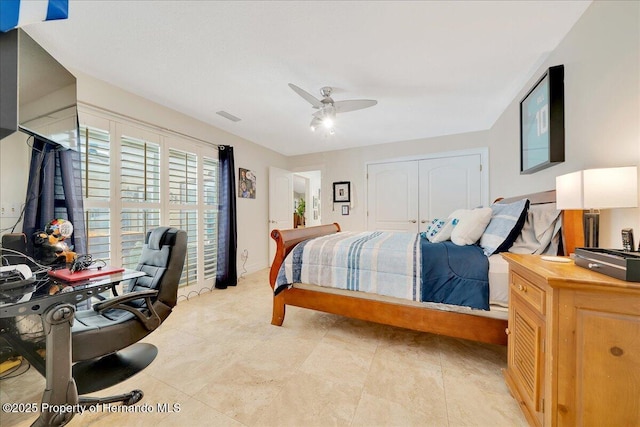 21000 Exeter Ct, Brooksville, FL 34601 - bedroom with a desk, a closet, ceiling fan, and light tile patterned floors