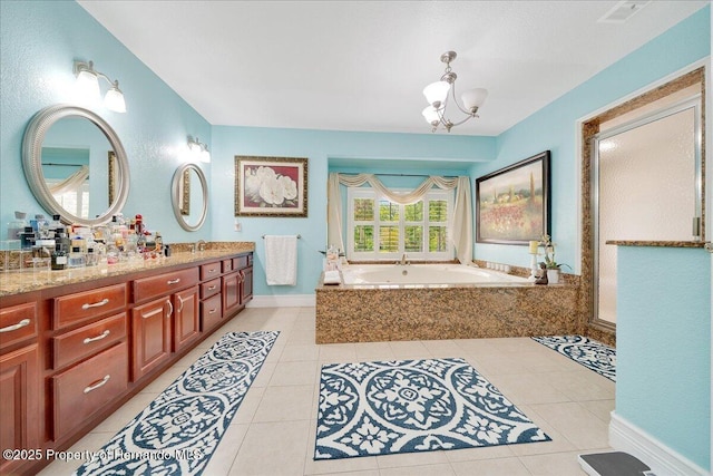 21000 Exeter Ct, Brooksville, FL 34601 - bathroom with a chandelier, a garden tub, tile patterned floors, and double vanity