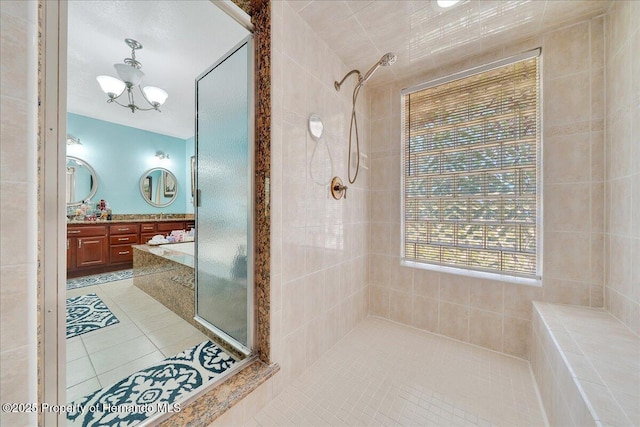21000 Exeter Ct, Brooksville, FL 34601 - full bath featuring a shower stall, tile patterned flooring, double vanity, and a chandelier