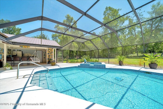 21000 Exeter Ct, Brooksville, FL 34601 - view of pool with a patio, a pool with connected hot tub, and glass enclosure