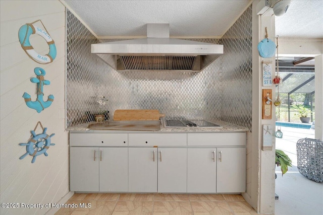21000 Exeter Ct, Brooksville, FL 34601 - kitchen with wall chimney range hood, light countertops, cooktop, decorative backsplash, and a textured ceiling