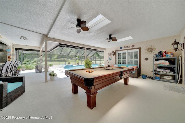 21000 Exeter Ct, Brooksville, FL 34601 - playroom featuring ceiling fan, a textured ceiling, billiards table, and a skylight