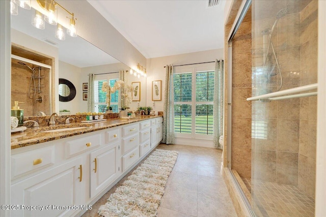 21000 Exeter Ct, Brooksville, FL 34601 - bathroom with double vanity, a stall shower, tile patterned flooring, and toilet