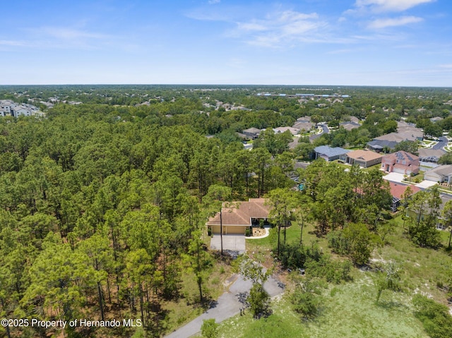 4960 Hidden Knob Trl, Spring Hill, FL 34609 - aerial view of property and surrounding area featuring a heavily wooded area
