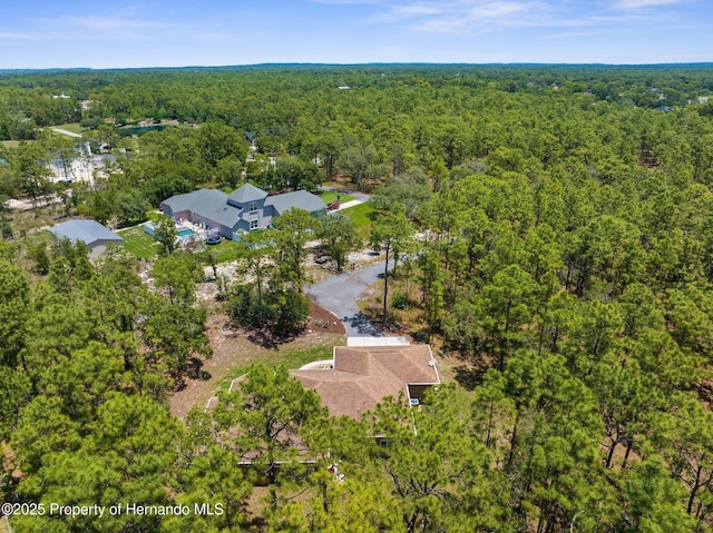 4960 Hidden Knob Trl, Spring Hill, FL 34609 - aerial view of property and surrounding area featuring a heavily wooded area