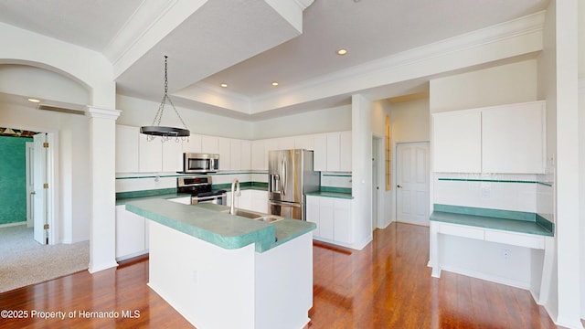 4048 St Ives Blvd, Spring Hill, FL 34609 - kitchen with appliances with stainless steel finishes, a sink, ornamental molding, dark wood finished floors, and tasteful backsplash
