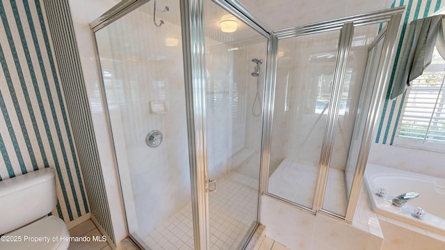 4048 St Ives Blvd, Spring Hill, FL 34609 - full bath featuring toilet, a shower stall, a garden tub, wallpapered walls, and tile patterned flooring