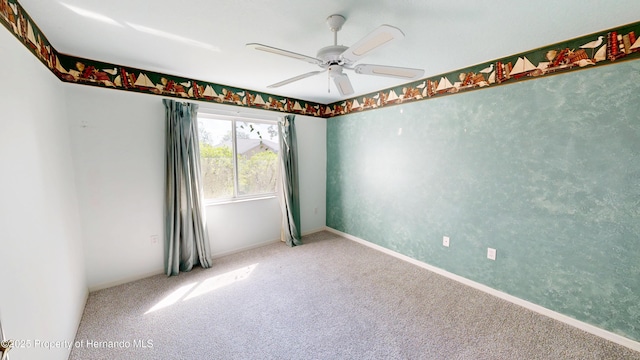 4048 St Ives Blvd, Spring Hill, FL 34609 - spare room with carpet floors, ceiling fan, and baseboards