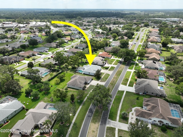4048 St Ives Blvd, Spring Hill, FL 34609 - aerial overview of property's location featuring nearby suburban area