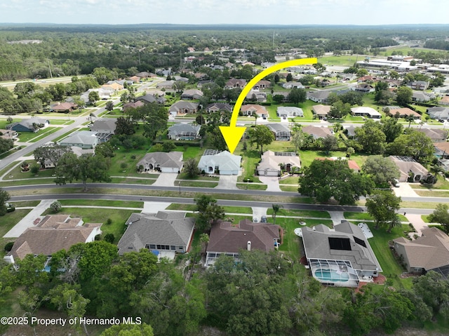 4048 St Ives Blvd, Spring Hill, FL 34609 - aerial view of property and surrounding area with nearby suburban area