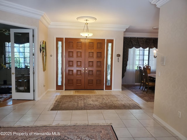 10430 Ramble Ridge Ct, Weeki Wachee, FL 34613 - foyer with crown molding, light tile patterned flooring, and baseboards