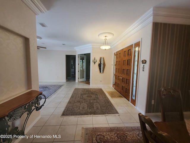 10430 Ramble Ridge Ct, Weeki Wachee, FL 34613 - foyer entrance featuring ornamental molding, light tile patterned floors, and baseboards