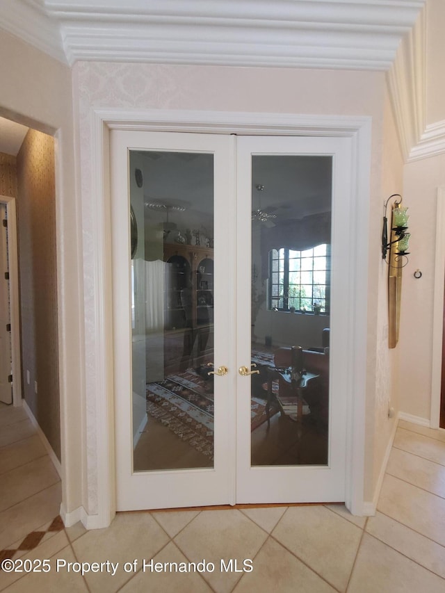 10430 Ramble Ridge Ct, Weeki Wachee, FL 34613 - detailed view of french doors, ornamental molding, and baseboards