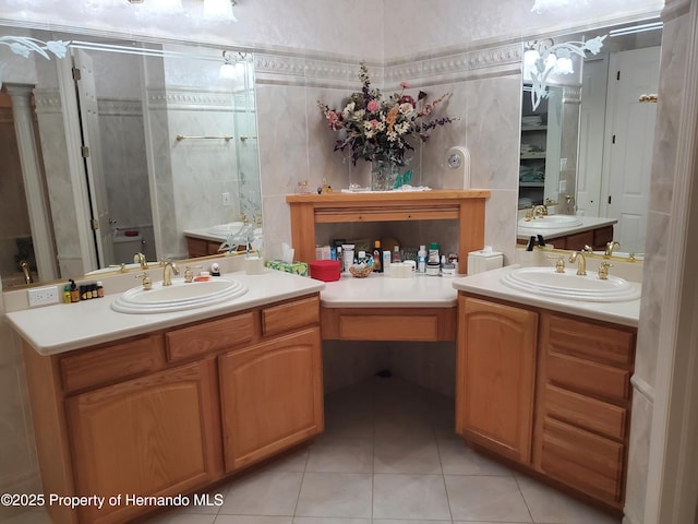 10430 Ramble Ridge Ct, Weeki Wachee, FL 34613 - full bath featuring tile patterned flooring, a stall shower, and two vanities