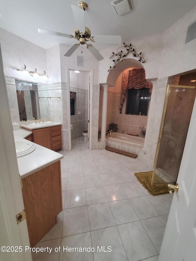 10430 Ramble Ridge Ct, Weeki Wachee, FL 34613 - full bath featuring tile patterned flooring, vanity, a garden tub, ceiling fan, and a shower stall