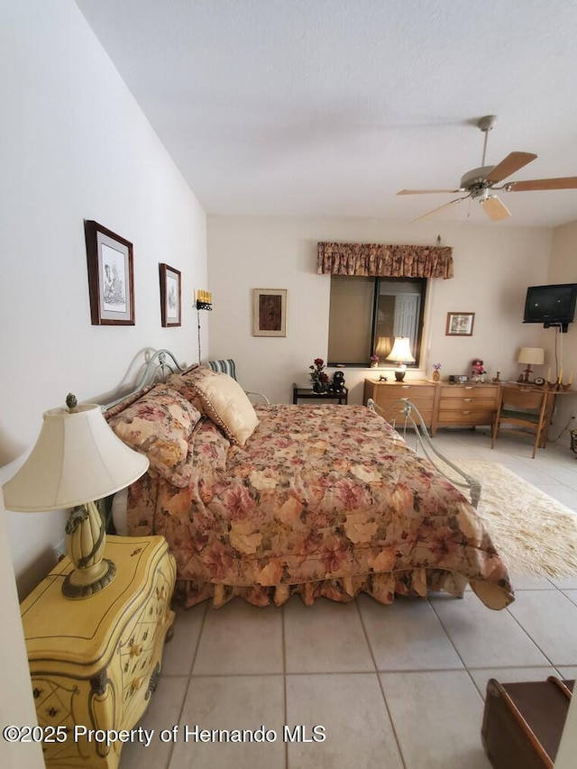 10430 Ramble Ridge Ct, Weeki Wachee, FL 34613 - bedroom with tile patterned flooring and a ceiling fan