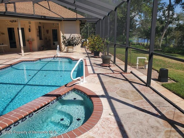 10430 Ramble Ridge Ct, Weeki Wachee, FL 34613 - swimming pool with a patio area, an in-ground hot tub, and glass enclosure