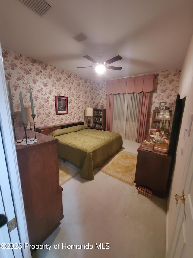 10430 Ramble Ridge Ct, Weeki Wachee, FL 34613 - bedroom featuring wallpapered walls