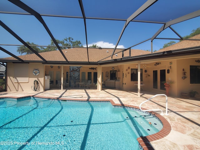 10430 Ramble Ridge Ct, Weeki Wachee, FL 34613 - outdoor pool featuring french doors, a ceiling fan, a patio area, and glass enclosure