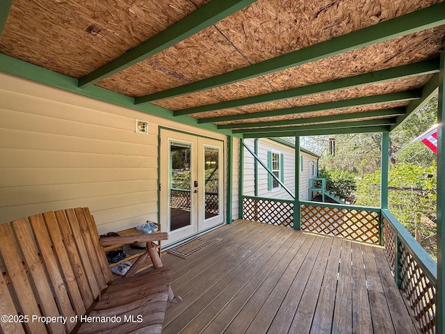 16173 Wiscon Rd, Brooksville, FL 34601 - wooden deck with french doors