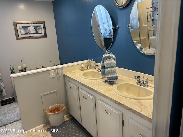 15693 Brookridge Blvd, Brooksville, FL 34613 - full bath with double vanity and tile patterned floors