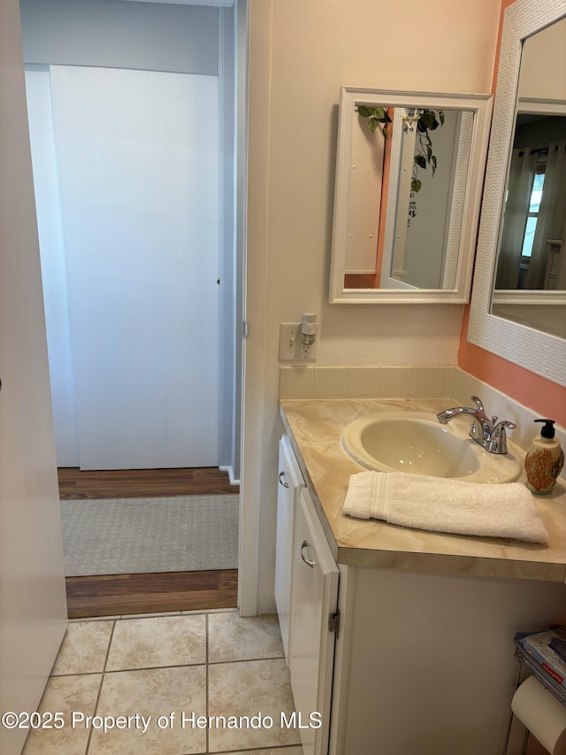 15693 Brookridge Blvd, Brooksville, FL 34613 - bathroom featuring vanity and tile patterned flooring