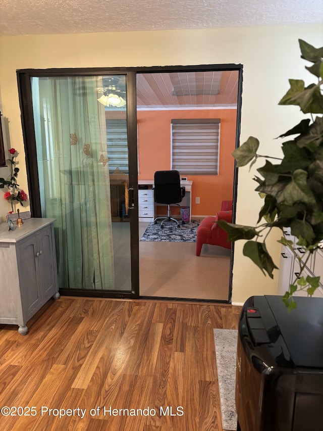 15693 Brookridge Blvd, Brooksville, FL 34613 - interior space with wood finished floors and a textured ceiling